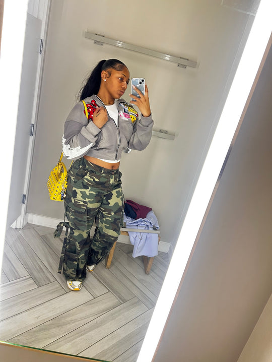 mirror selfie in the cropped ash k1 zip up and camo cargo pants